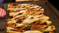 Puff pastry twists with sun-dried tomato pesto