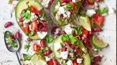 Stuffed avocado with spicy beans & feta