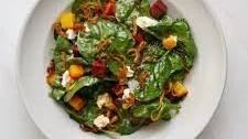 Warm Spinach Salad with Roasted Beets, Goat Cheese and Crispy Shallots