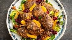 Confit duck leg platter with cranberry sauce