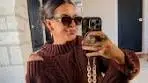 Get more use out of your sweaters by wearing them as chic ...