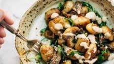 Mushroom Gnocchi with Arugula and Walnut Pesto