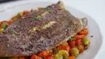 Pan-fried lemon sole with tomato, olive and caper sauce