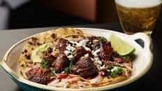 Lamb tacos with salsa verde and avocado