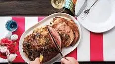 leg of lamb stuffed with artichokes, spinach and red peppers