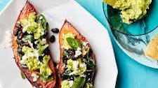 Stuffed Sweet Potatoes with Black Beans, Spinach, and Guacamole