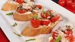 Blistered Tomato and Herbed Goat Cheese Crostini