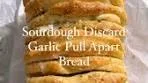 Garlic bread in layers? Yes please! This Sourdough Discard ...