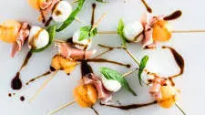 Melon, Prosciutto and Mozzarella Skewers with Balsamic Glaze