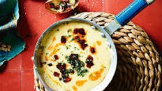Queso fundido (Mexican cheese fondue) with hot potato skins