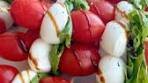 mini caprese skewers because putting things on a skewer ...
