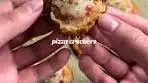 Pizza crackers are a fun snack made by topping crackers with ...