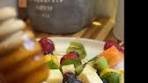 Fruit and cheese skewers with a drizzle of honey and edible ...