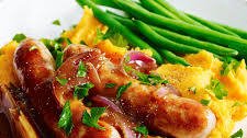 Bangers and sweet potato mash with onion gravy