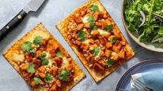 BBQ chicken, corn, and fresh mozzarella pizzas with arugula salad