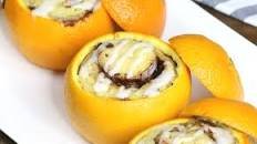 Campfire Cinnamon Rolls in Orange Shells