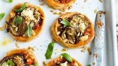 Caramelised onion, aubergine and feta tarts