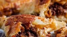 Cheesy Bolognese pies