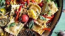 Garden Veggie and Ravioli Skillet with Pistachio Herb Butter.