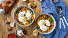 Hearty Vegetable Soup Topped With Eggs