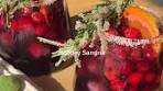 Holiday Sangria. - 1/2 cup cranberries - 1 orange - 2 cups ...