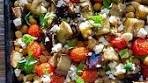 Roasted eggplant, chickpeas and burst tomatoes with some ...