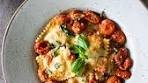 Tender beef ravioli with a luscious butter roasted tomato ...
