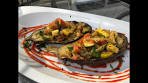 Vegan Stuffed eggplant with sautéed vegetables ratatouille style