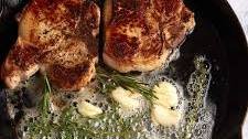 Garlic Butter Pork Chops in a Cast Iron Skillet Thumbnail