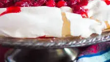 Pavlova Dessert with Cranberry Amaretto Sauce Thumbnail