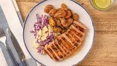 Sweet and Spicy Maple Pork Chop with red cabbage slaw and roasted potatoes Thumbnail