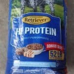 High protein dog food bag featuring Retriever brand, designed for optimal performance with 52% protein content, ideal for active dogs.