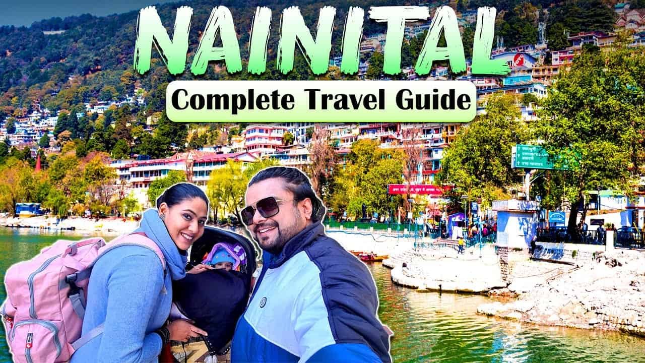 Selfie of travelers enjoying a scenic view in Nainital, India, with a vibrant lake and greenery in the background, promoting a complete travel guide.