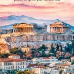 Aerial view of the Acropolis in Athens, Greece, showcasing the Parthenon and ancient ruins against a colorful sunset sky, with modern buildings in the foreground.