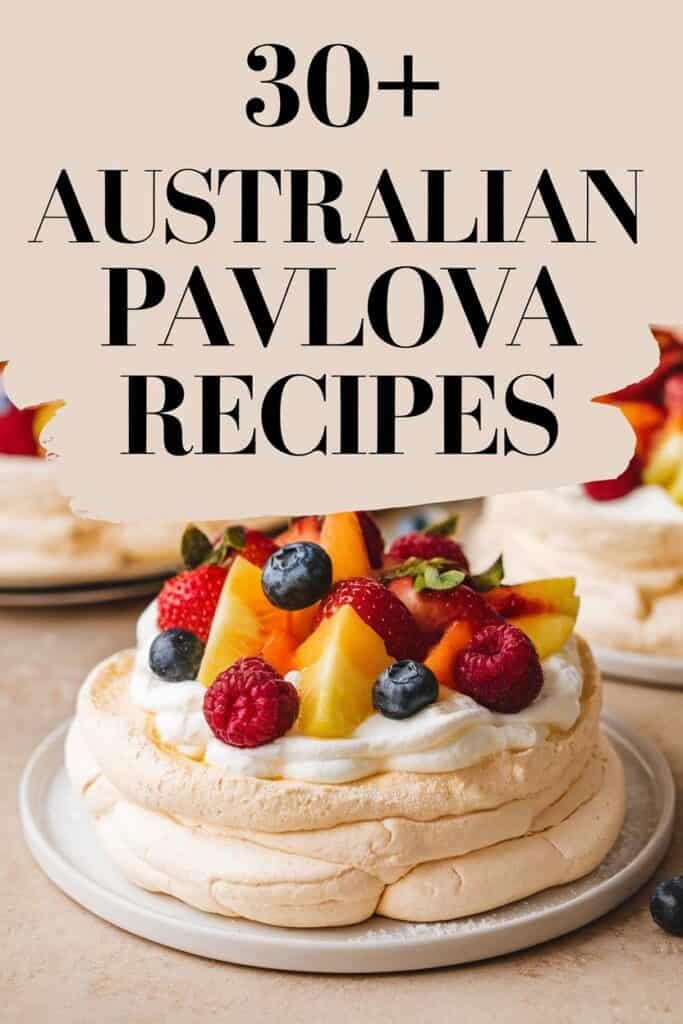 A beautifully presented pavlova topped with fresh fruits such as strawberries, blueberries, raspberries, and mango, showcasing a collection of over 30 Australian pavlova recipes.