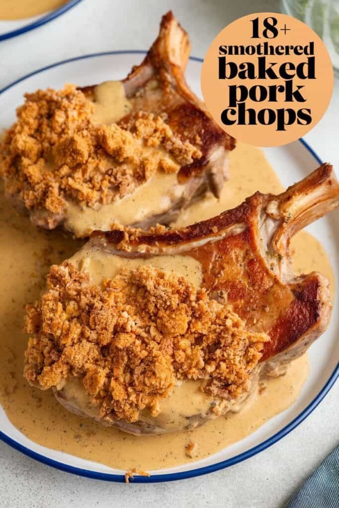 Smothered baked pork chops topped with a crispy crumb coating and creamy sauce, served on a white plate with a blue rim. Perfect for a savory dinner option.