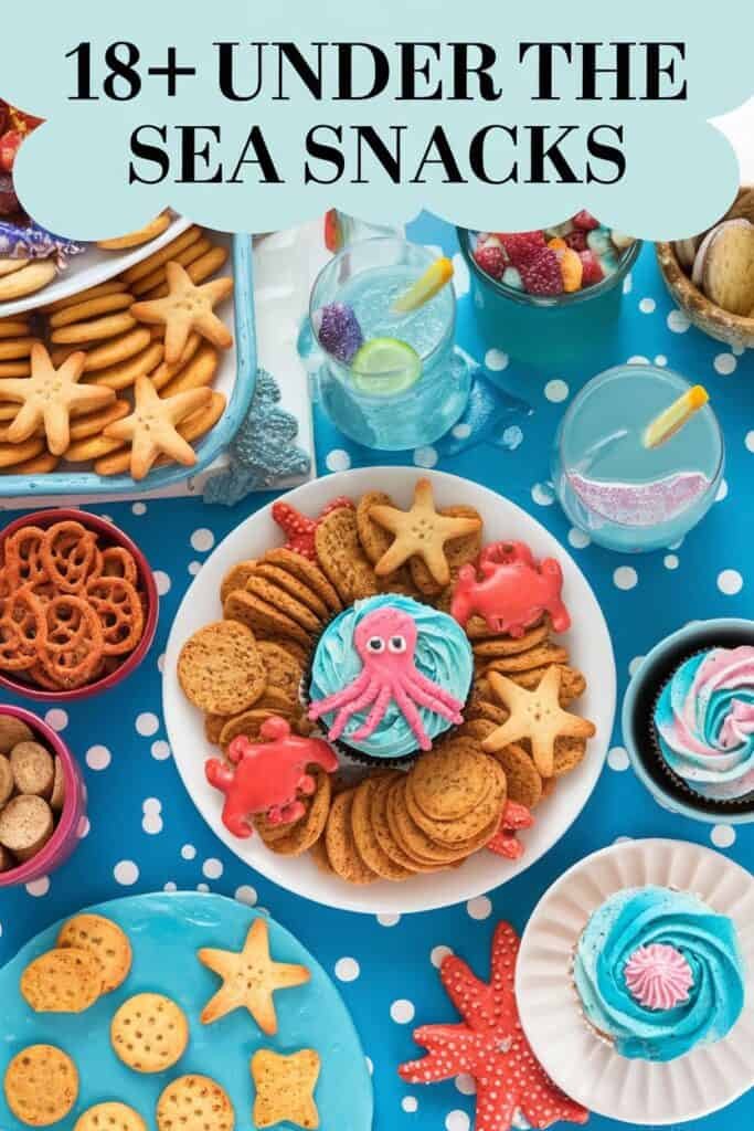 Colorful assortment of 18+ under the sea snacks, featuring star-shaped cookies, themed cupcakes with octopus decorations, pretzels, and vibrant drinks on a blue polka dot tablecloth.